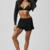 Chemise courte à manches longues boutonnée en soie lumineuse – Noir