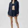 Chemise à manches longues semi-transparente « Golden Hour » à boutons – Bleu marine