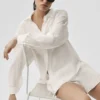 Chemise à manches longues semi-transparente « Golden Hour » à boutons – Ivoire