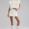 Gilet court en fausse fourrure somptueuse - Ivoire