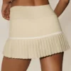 Jupe de tennis « My Serve » en coton et cachemire High-Waist – Beige sable/Blanc