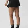 Jupe de tennis taille basse « Amp It up » – Noir