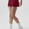 Jupe de tennis taille basse « Amp It up » – Rouge « Summer Romance »