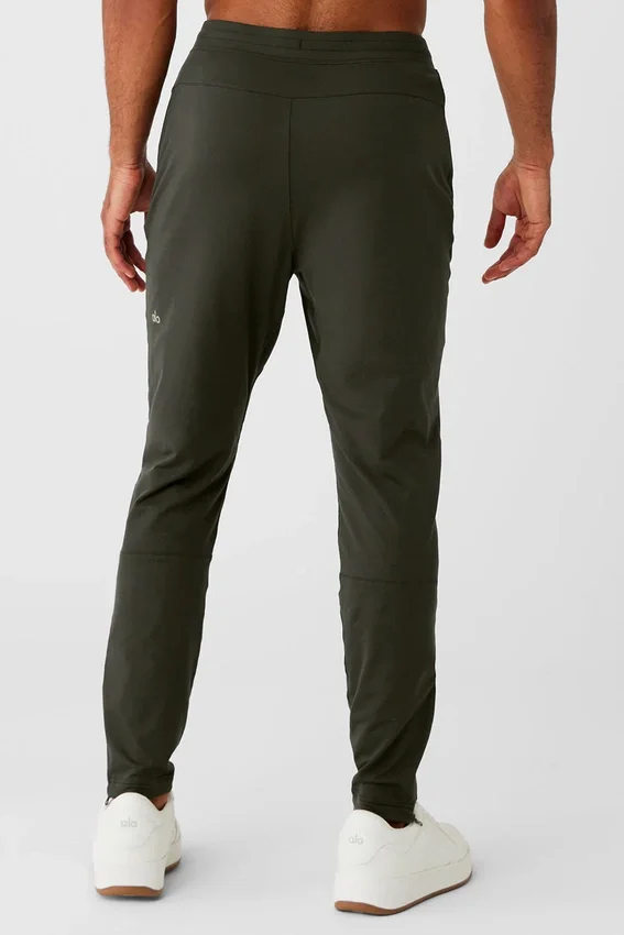 Pantalon de performance Conquer React - Vert furtif