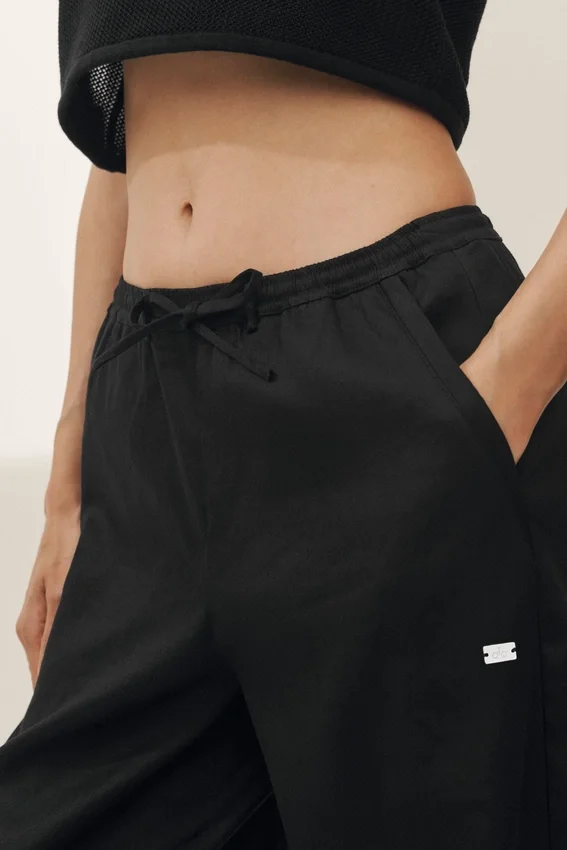 Pantalon à jambes larges Riviera en mélange de lin – Noir