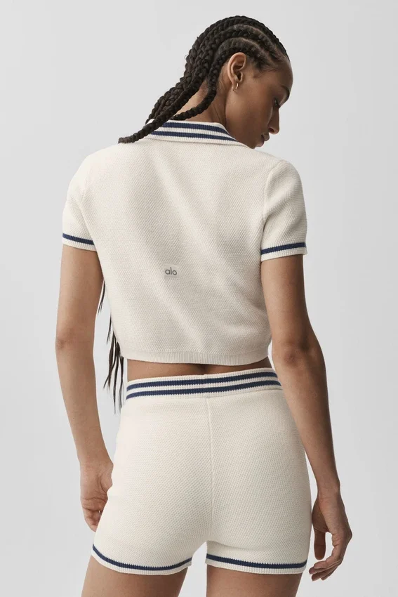 Pull tennis club en maille – Ivoire/Bleu marine