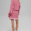 Pull zippé intégral en maille Tennis Club – Rose sauvage/Blanc