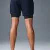 Shorts de performance 2-en-1 Conquer React - Bleu marine/Noir