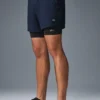 Shorts de performance 2-en-1 Conquer React - Bleu marine/Noir
