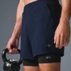 Shorts de performance 2-en-1 Conquer React - Bleu marine/Noir