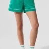 Shorts de sport Motivate - Vert sapin/Blanc