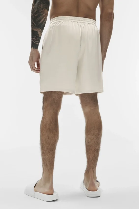 Shorts Horizon en satin 7" - Couleur os